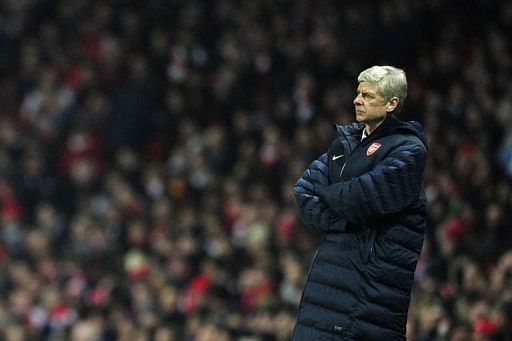 Arsenal's Arsene Wenger watches the action from the touchline in north London on February 19, 2013